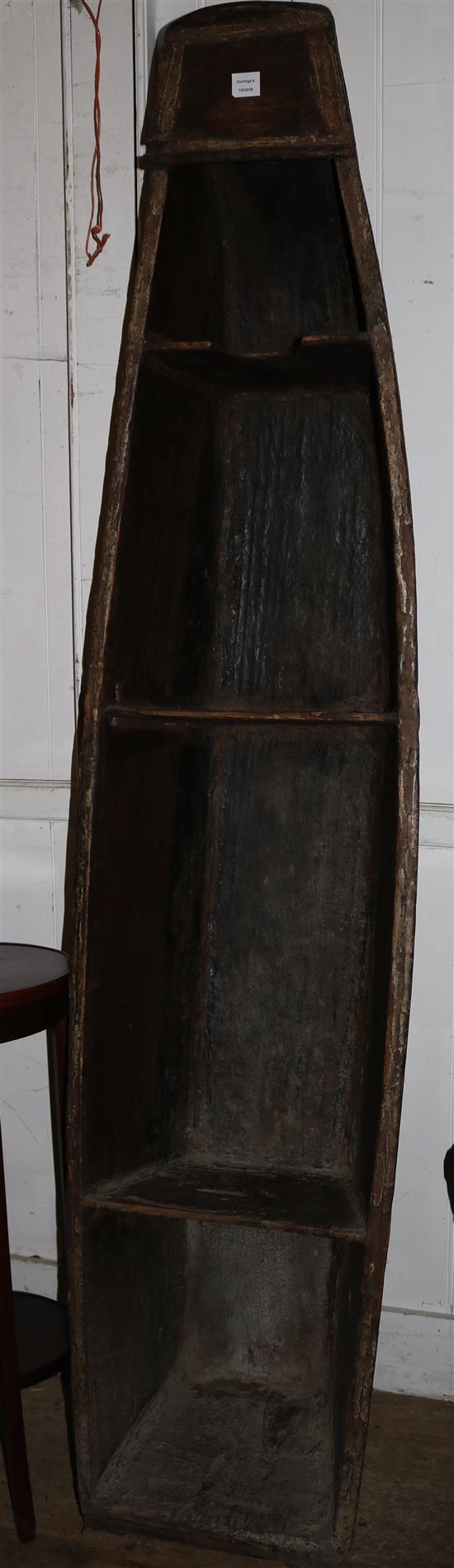 Chinese canoe converted to a standing bookcase